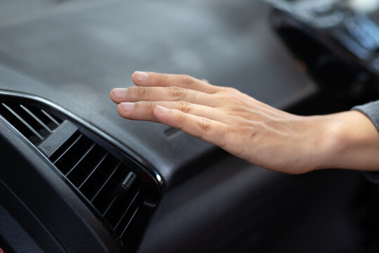 car driving concept Driver testing car air conditioner
  Check the car air conditioner. car cooling system