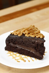 Chocolate cake slice with caramel icing