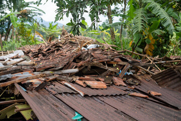 Homes were damaged triggered by the 5.6 magnitude earthquake that killed at least 271 people, with hundreds injured.