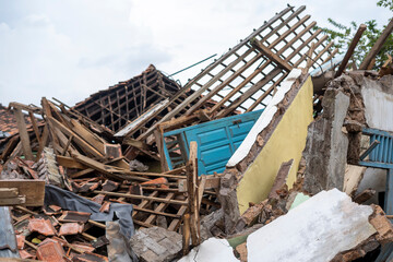 Homes were damaged triggered by the 5.6 magnitude earthquake that killed at least 271 people, with...