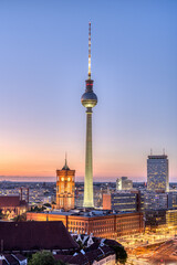 Downtown Berlin with the famous TV Tower and the town hall after sunset