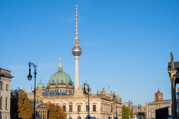 The famous TV Tower and some historic buildings at the Unter den Linden boulevard in Berlin, Germany