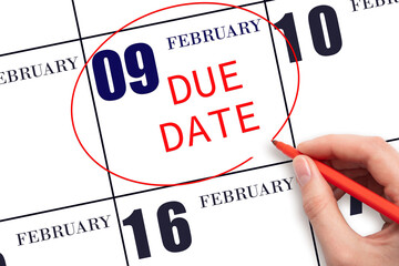 Hand writing text DUE DATE on calendar date February 9 and circling it. Payment due date