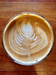 A cup of coffee with a beautiful latte art