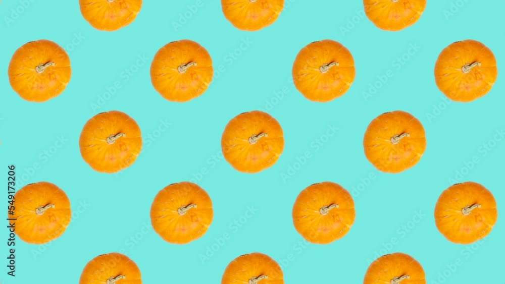 Poster orange pumpkins in grid in seamless loop pattern on a blue background. orange vegetables in seamless