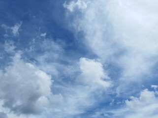 Fototapeta premium Clear blue sky with cloudy as a background wallpaper, pastel sky wallpaper Beautiful Day. Marble Sky Heaven Clear Sky Blue And White. Cloud mood aesthetic.