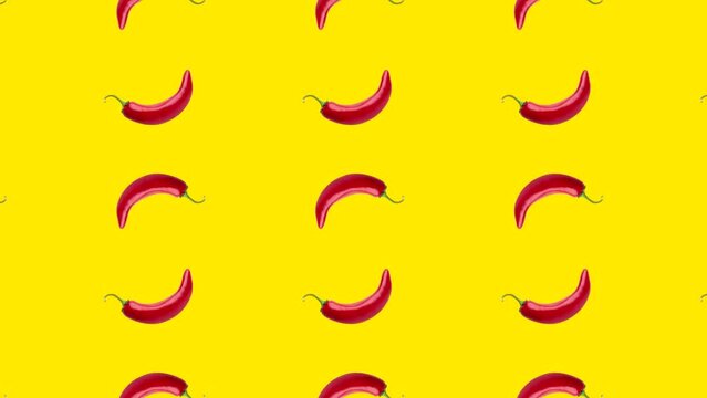 Seamless loop pattern with Chili peppers on a yellow background. Exotic fruits in seamless loop animation. Endless food motion graphic background