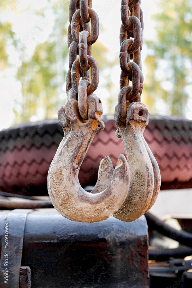 Poster crane hook for lifting loads. lifting device for stacking cargo. lifting and moving heavy loads on a