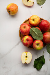 Top view red apples on plate fresh fruits