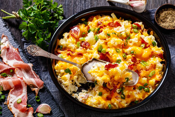 cauliflower bacon cheese casserole in baking dish