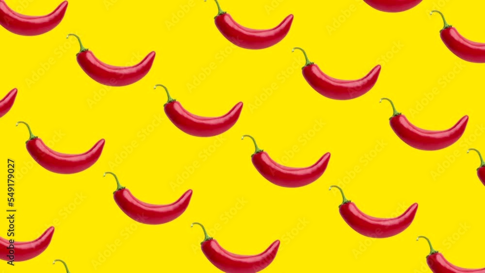 Poster seamless loop pattern with chili peppers on a yellow background. exotic fruits in seamless loop anim