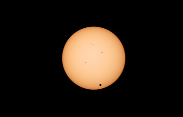 The Transit of Venus in 2012 showing the planet silhouetted against the solar disk with sunspots