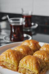 Turkish sweet - pistachio baklava and Turkish tea.