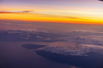 Fototapeta na wymiar View From The Airplane Window at Dawn