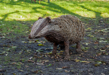 woven willow flora and fauna sculptures in a large garden © Martin