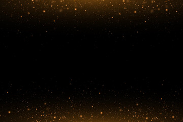 Christmas festive background of light confetti and small shining golden lights on a black background. Shiny golden texture. Christmas effect for luxury greeting card.