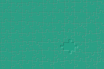 Embossed, missing piece of a green jigsaw puzzle.