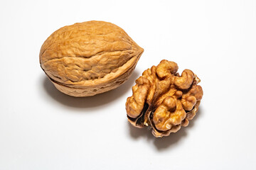 Walnut, European walnut (Juglans regia L.) open and closed, isolated on white background, full depth focus.