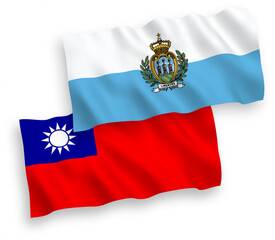 National vector fabric wave flags of San Marino and Taiwan isolated on white background. 1 to 2 proportion.