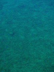 a clean sea and the rocks in it