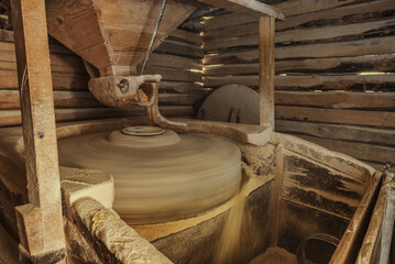Working old water powered grist mill - obrazy, fototapety, plakaty