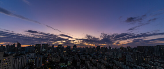 Urban construction in Qingdao, China during the sunset, panorama, copy space for text