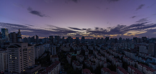 Beautiful modern city panorama during late sunset