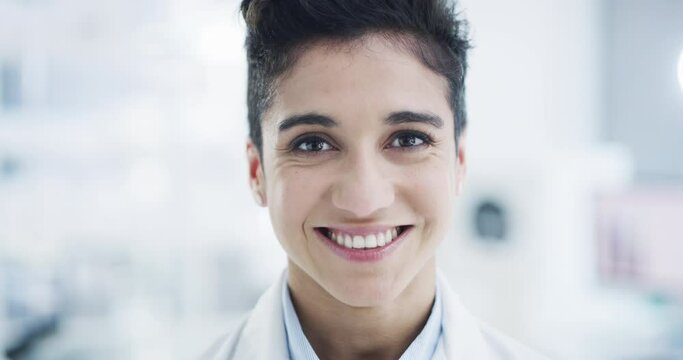 Happy, smile and portrait of woman scientist standing in lab while doing medical research. Success, headshot and female biologist working on science innovation project in a pharmaceutical laboratory.