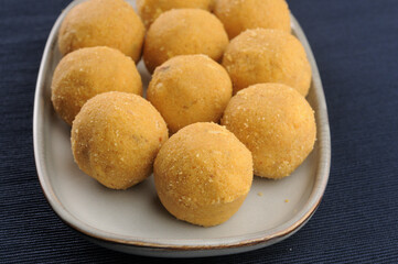 Besan ladoo, an Indian sweet dish made during festivals or celebrations like weddings