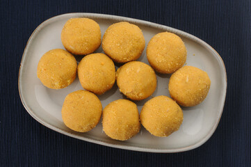 Besan ladoo, an Indian sweet dish made during festivals or celebrations like weddings