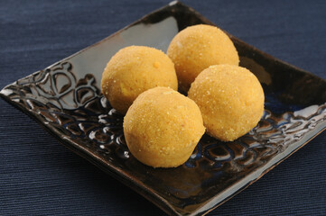 Besan ladoo, an Indian sweet dish made during festivals or celebrations like weddings