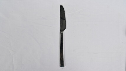 Stainless steel kitchen glossy metal knife isolated over the white background