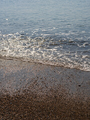 sandy beach and sea waves