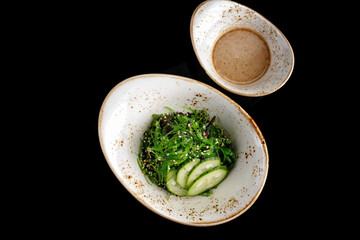 Hiyashi salad with seaweed and nut sauce