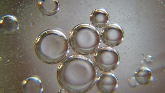 Oil bubbles and water. Space looking macro shot. High quality 4k footage