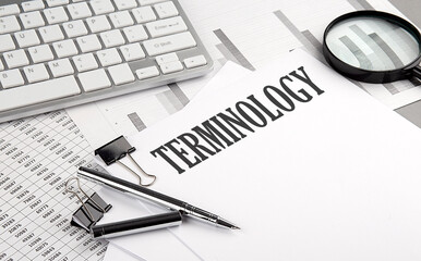 TERMINOLOGY text on paper with chart and keyboard, business concept