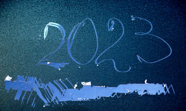 2023 New Year Written On Frosty Car Glass