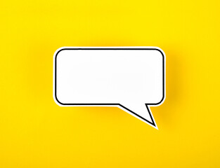 The Speech bubble with copy space communication talking speaking concepts on yellow background.