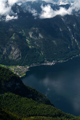 View of the mountains and Hallstatt village with lakes in the  valley from the 5 Fingers view point at Dachstein Mountain in Austria, Alps. Hallstatt.