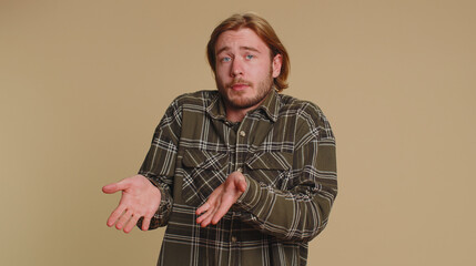 Man raising hands asking what why reason of failure demonstrating disbelief irritation by troubles,...