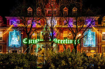 View of Leicester town hall square in the night decorated for Christmas time