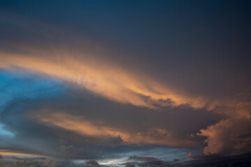 Clouds at sunset in golden color