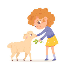 Kid feeding funny lamb, cute girl holding branch with green leaves to feed little sheep