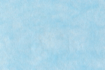 Obraz premium blue spunbond texture background. a high resolution surface of spunbond. Medical face mask material