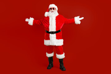 Full length body size view of his he nice funny cheerful cheery positive white-haired Santa fooling having fun rest chill grimacing isolated bright vivid shine vibrant yellow color background
