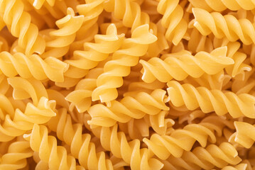 fusilli pasta closeup background