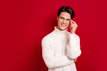 Photo of intellectual genius brunet hair man wear white jumper touch his new eyeglasses look deep...