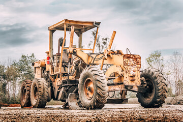 Obraz premium Grader vehicle construction side