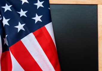 American USA flag and black blackboard for text 