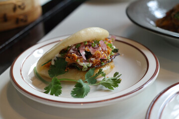 Gaoobao Taiwanese dumplings with grilled pork belly and pickles